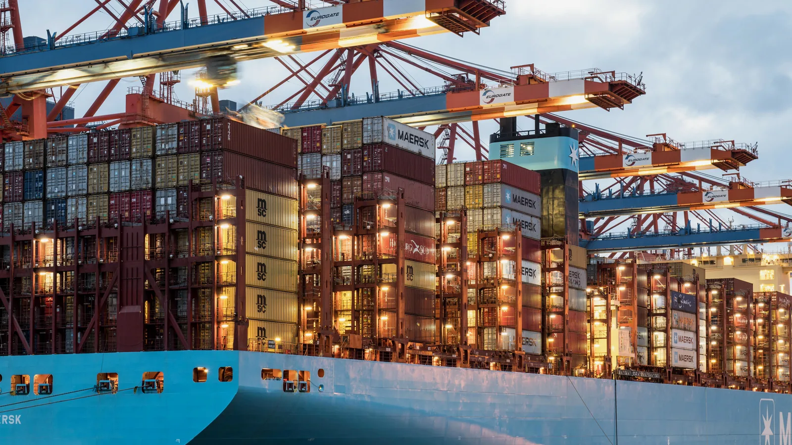 Container ship and cranes at a commercial port